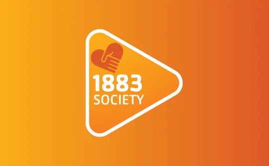 turned triangle icon, heart hand at top and "1883 society" text inside