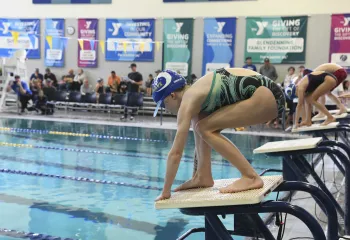 swimmer starting a race