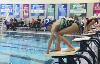 swimmer starting a race